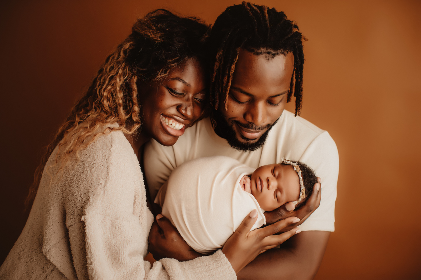 Family Portrait with Newborn Baby in a Studio Shoot 